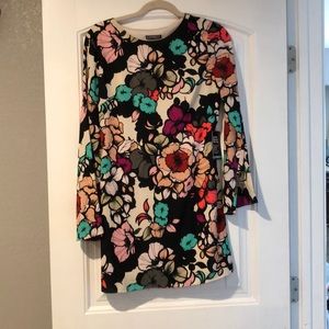 Floral long sleeve open back mini dress